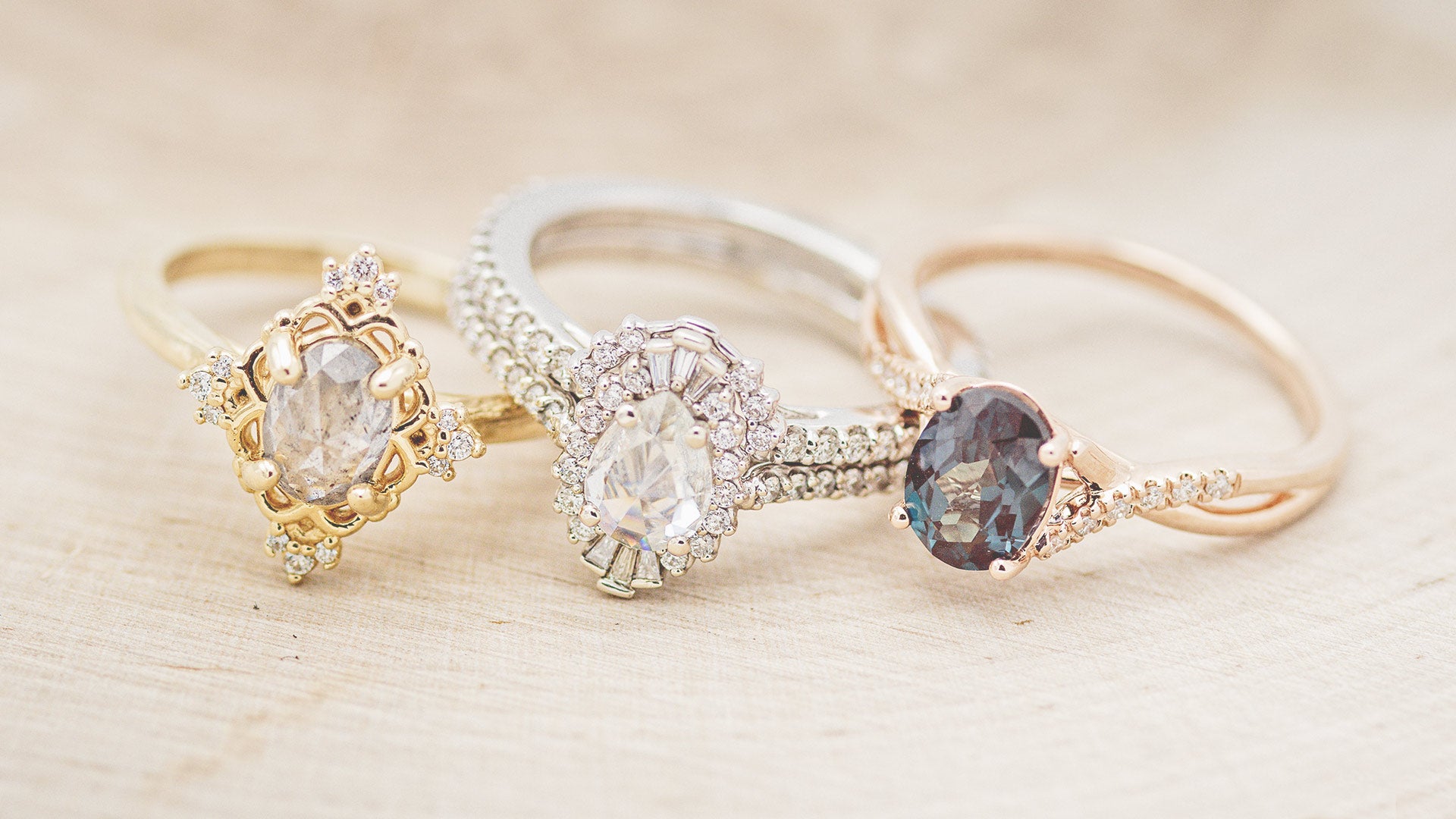 3 rings on display with white background